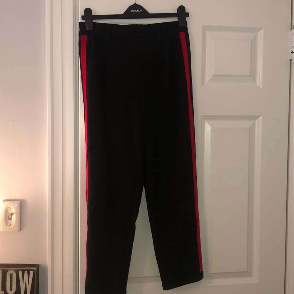 Black trousers with stripe